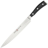 Wusthof Classic Ikon - 9" Carving Knife w/Hollow Edge by Wüsthof – 9 inches, Black, Model 4504/23-7
