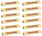 Toblerone SWISS MILK CHOCOLATE WITH HONEY AND ALMOND NOUGAT 12 X 100 G BARS
