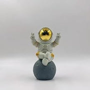 Cute Gold White Astronaut Statue, Spaceman Figurine Decor. | Cute astronaut figurine with victory gesture. Solid textured statue, artistic ornament for desk and shelf home decoration.