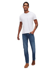 Luxe Performance Plus Slimmy in Mid Blue by 7 For All Mankind – Mid Blue