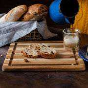 Cutting Board With Juice Canal - Square Teak Wood Serving Board (12 x 12 x .55 in.) - By by Teakhaus – 11.8"L x 11.8"W, Teak Wood, Brown