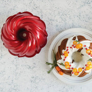 Holiday Formed 11-Cup Swirl Bundt Pan | Red by Nordic Ware – 11-Cup, 11.0 cups, Aluminum, Red, Model 53325