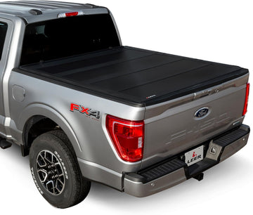 HF650M | Fits 2017+ Ford Superduty with 6.9 FT Bed | Hard by LEER – 2017+ Ford Superduty 6.9 FT Bed, Plastic, Black, Model 650400