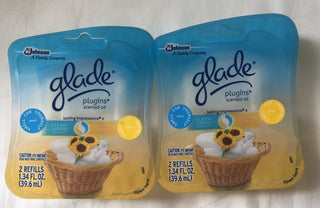 4 PLUGINS SCENTED OIL REFILLS 2 CLEAN LINEN / 2 SUNNY DAYS SEALED PACKS by Glade – Blue, Pack of 4, Model 70500