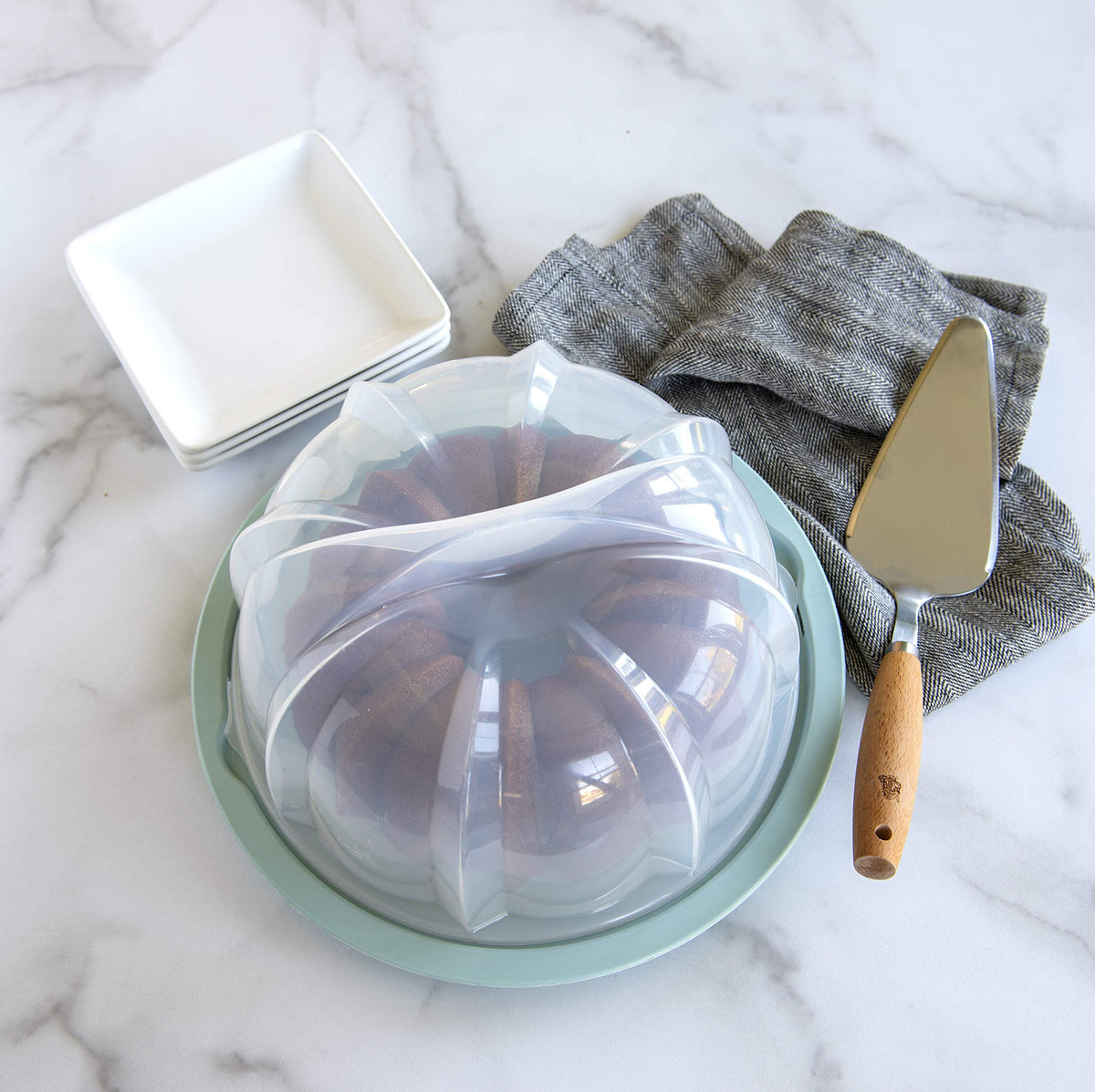 Translucent Bundt Cake Keeper by Nordic Ware – 10.7" x 10.7" x 6.1", 440.2 cubic_inches, Plastic, Sea Glass, Model 50099AMZM