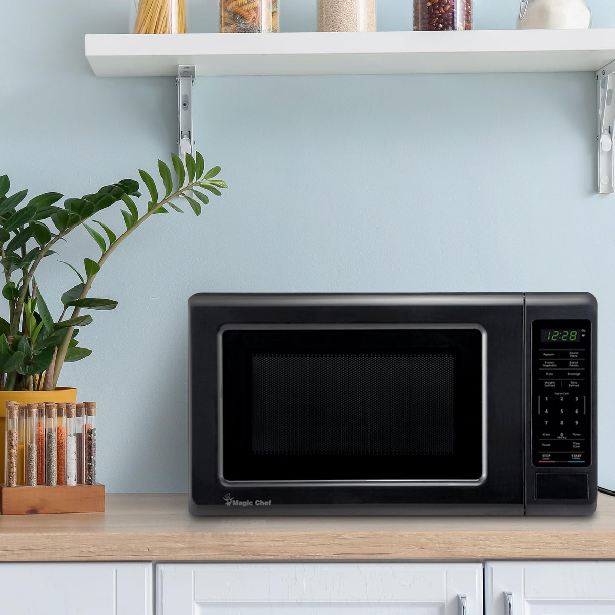 0.7 cu. ft. Countertop Microwave in Black - 700W (10.1"H x 17"W x 12.5"D) by Magic Chef – 0.7 cu. ft., 0.7 cubic_feet, Steel, Black, Model MC77MB
