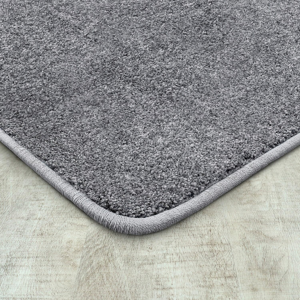 Endurance Solid Colored Area Rug in Color Silver by Joy Carpets – 4' x 6' (Rectangular), Polyester, Silver, Model 80N-12