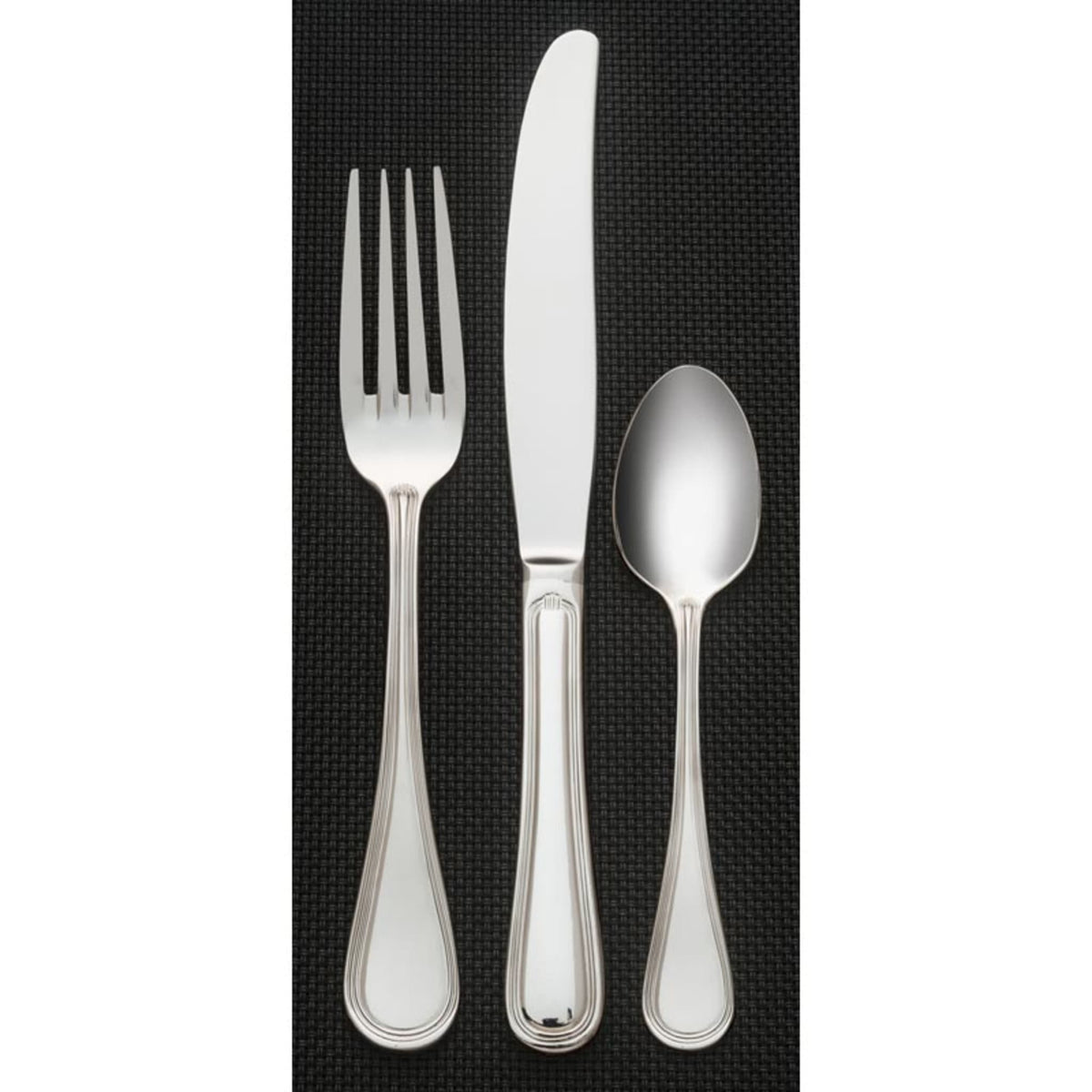 Libbey 774 Geneva Stainless Steel Teaspoon, Silver, 12/Case - 4 3/8" Demitasse Spoon
