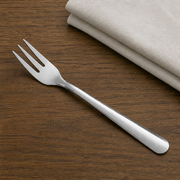 Silver 18/0 Stainless Steel Cocktail / Oyster Fork Flatware - 5 5/8" - 60/Case - lifestyle