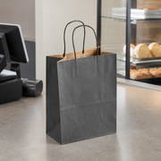 Black Paper Shopping Bag with Paper Handles, 8" x 4 1/2" x 10 1/4", 60 lb., 250/Case - lifestyle