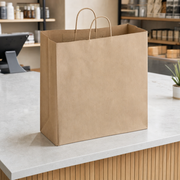 Paper Shopping Bag with Paper Handles, Brown, 16" x 6" x 15 3/4", 65 lb., 200/Case - lifestyle