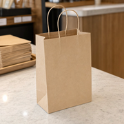 Brown Paper Shopping Bag with Paper Handles, 5 1/2" x 3 1/4" x 8 3/8", 60 lb., 250/Case - lifestyle