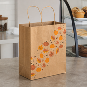 Paper Shopping Bag with Paper Handles, Autumn, 8" x 4 1/2" x 10 1/4", 60 lb., 250/Case - lifestyle