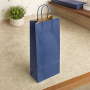 Paper Shopping Bag with Paper Handles, Navy Blue, 5 1/2" x 3 1/4" x 13 1/8", 65 lb., 250/Case - lifestyle